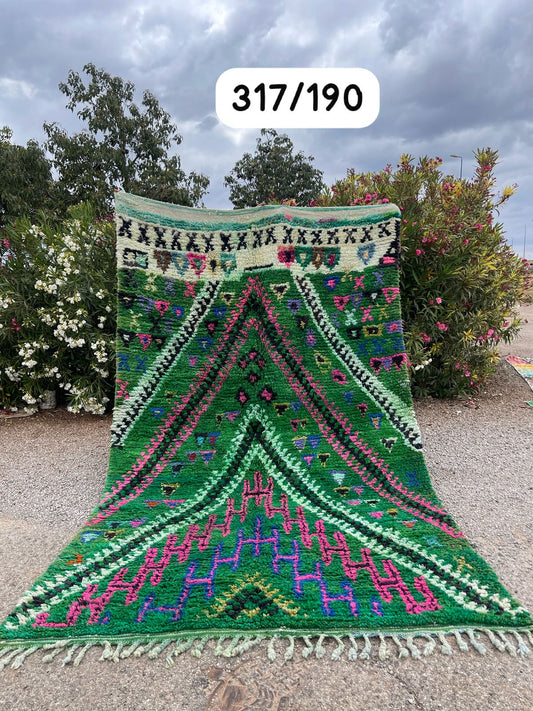 Transform your space with the exquisite charm of our Fabulous Boujad Rug, a true work of art crafted by skilled artisans in the heart of Morocco. This authentic Moroccan rug showcases the rich heritage and vibrant culture of the Boujad region
