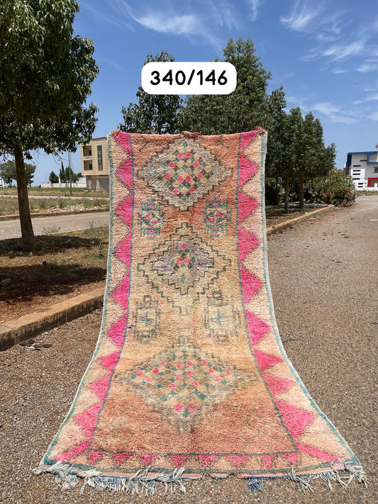 Transform your space with the exquisite charm of our Fabulous Boujad Rug, a true work of art crafted by skilled artisans in the heart of Morocco. This authentic Moroccan rug showcases the rich heritage and vibrant culture of the Boujad region