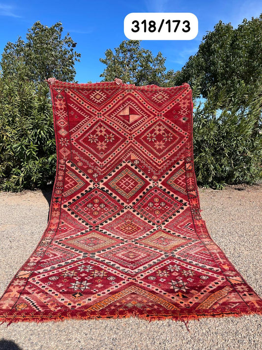 Transform your space with the exquisite charm of our Fabulous Boujad Rug, a true work of art crafted by skilled artisans in the heart of Morocco. This authentic Moroccan rug showcases the rich heritage and vibrant culture of the Boujad region