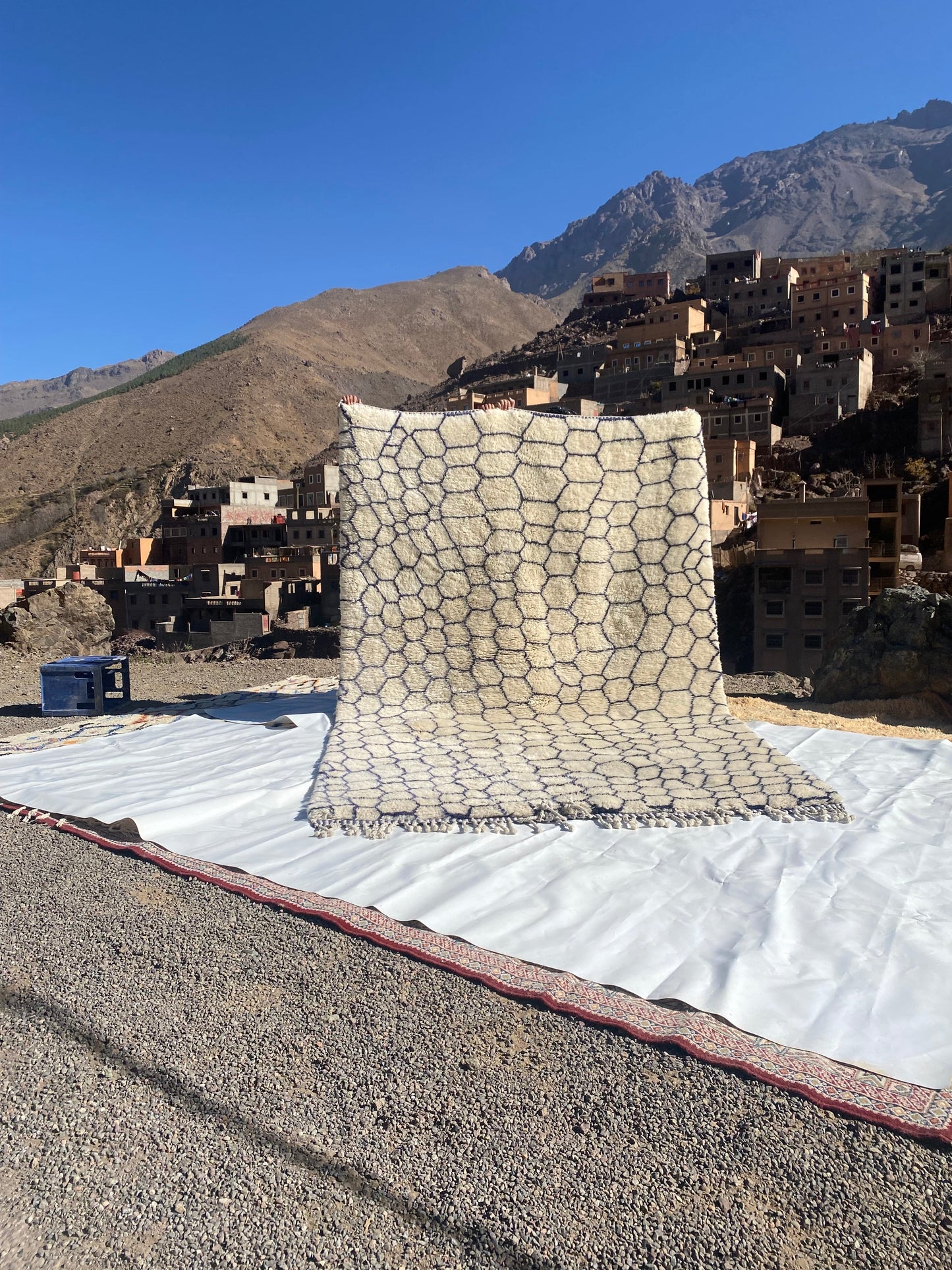 Beni Ourain rugs originate from the Atlas Mountains of Morocco and are characterized by their distinctive, neutral-toned, and geometric designs. These handwoven rugs often feature a plush pile and are made by the Berber tribes,  size is 320x206 cm