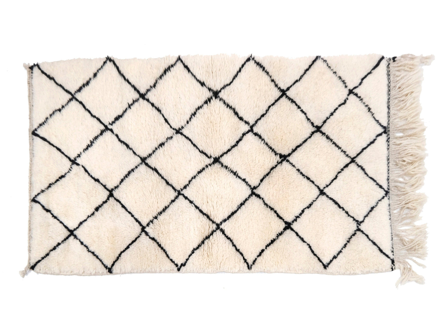 "Woven Dreams: Moroccan Beni Ourain Rugs for Timeless Style"