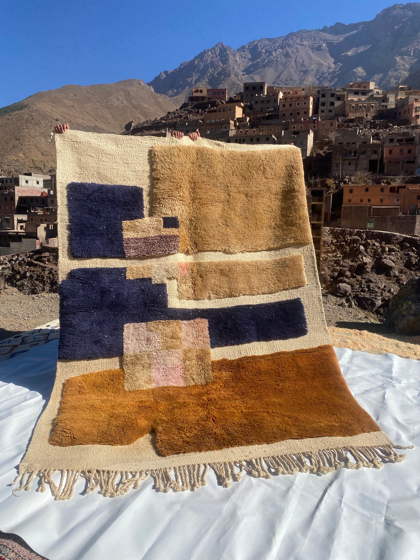 Beni Ourain rugs originate from the Atlas Mountains of Morocco and are characterized by their distinctive, neutral-toned, and geometric designs. These handwoven rugs often feature a plush pile and are made by the Berber tribes,  size is 260x165 cm