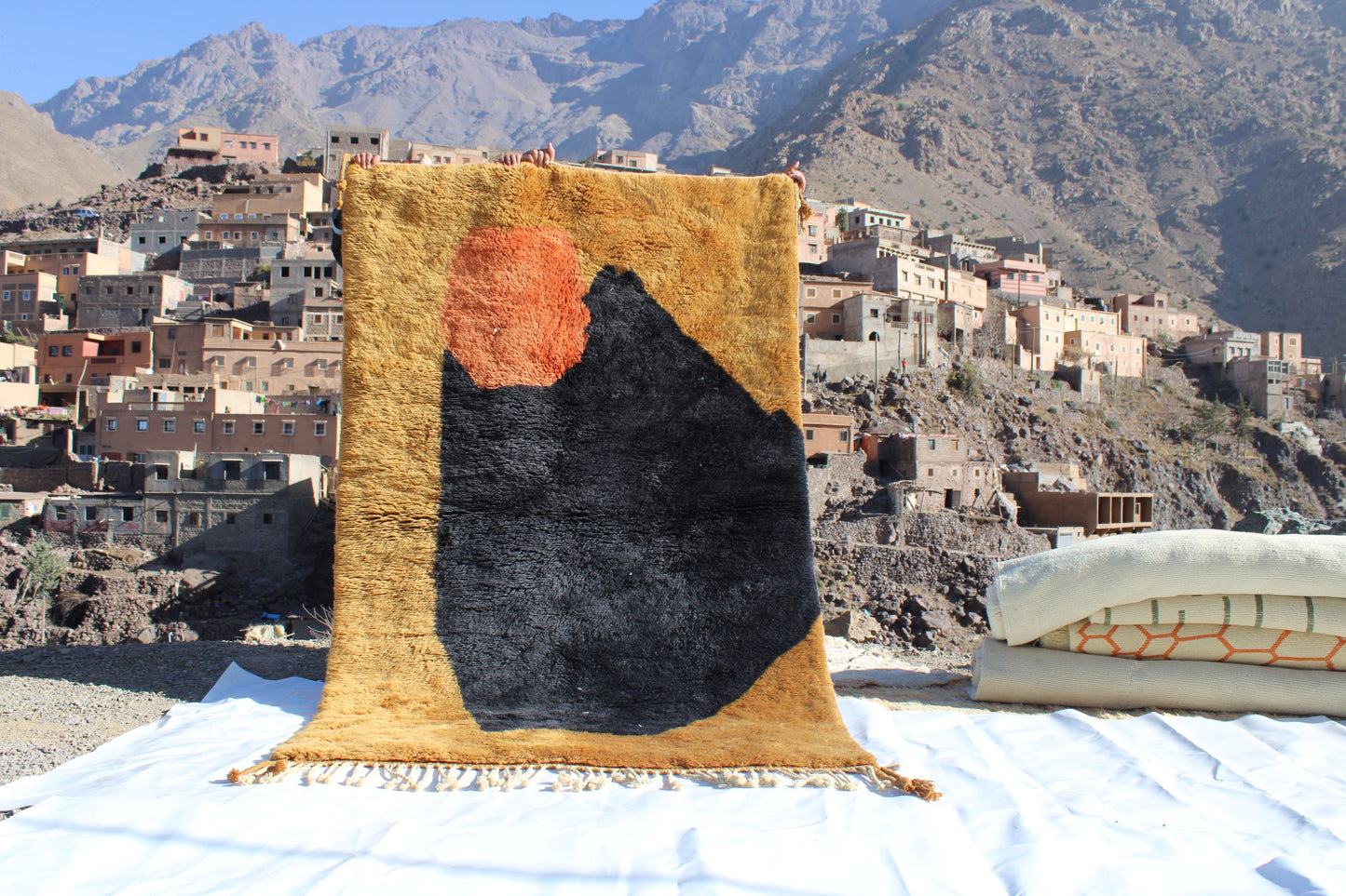 Beni Ourain rugs originate from the Atlas Mountains of Morocco and are characterized by their distinctive, neutral-toned, and geometric designs. These handwoven rugs often feature a plush pile and are made by the Berber tribes,  size is 240x150 cm