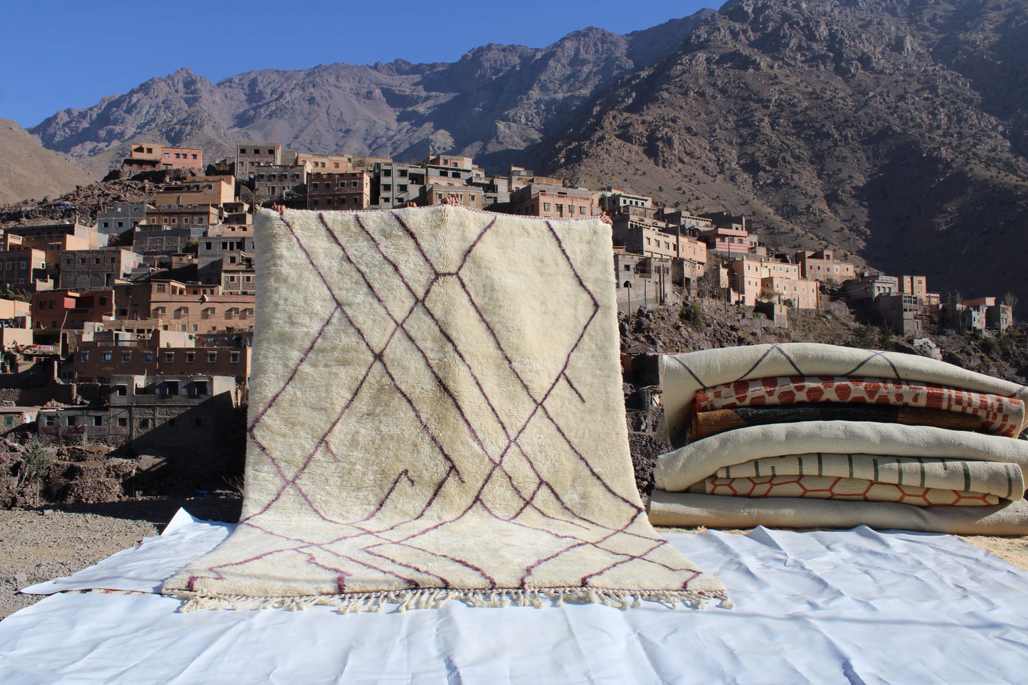 Beni Ourain rugs originate from the Atlas Mountains of Morocco and are characterized by their distinctive, neutral-toned, and geometric designs. These handwoven rugs often feature a plush pile and are made by the Berber tribes,  size is 310x210 cm