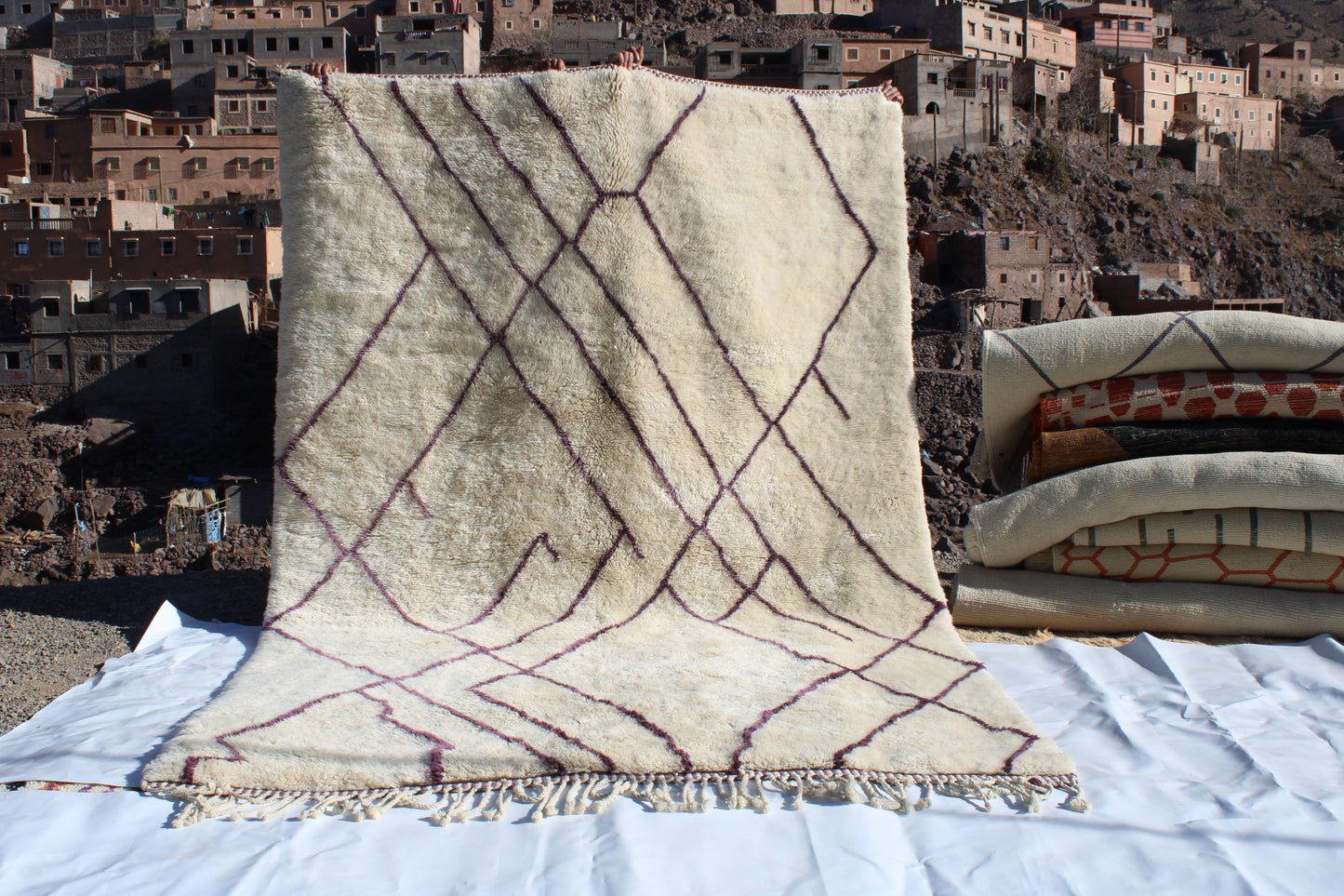 Beni Ourain rugs originate from the Atlas Mountains of Morocco and are characterized by their distinctive, neutral-toned, and geometric designs. These handwoven rugs often feature a plush pile and are made by the Berber tribes,  size is 310x210 cm