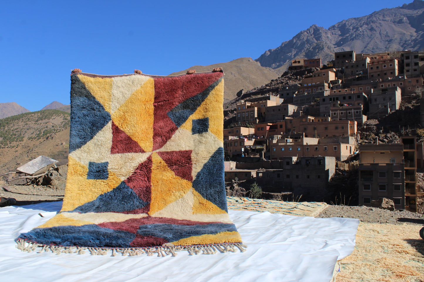 Beni Ourain rugs originate from the Atlas Mountains of Morocco and are characterized by their distinctive, neutral-toned, and geometric designs. These handwoven rugs often feature a plush pile and are made by the Berber tribes,  size is 300x180 cm