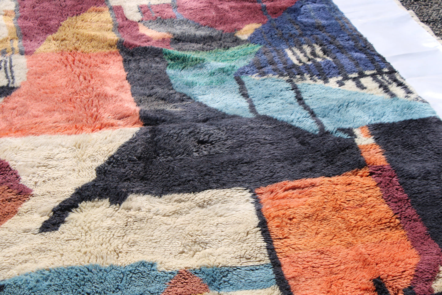 Beni Ourain rugs originate from the Atlas Mountains of Morocco and are characterized by their distinctive, neutral-toned, and geometric designs. These handwoven rugs often feature a plush pile and are made by the Berber tribes,  size is 270x192 cm