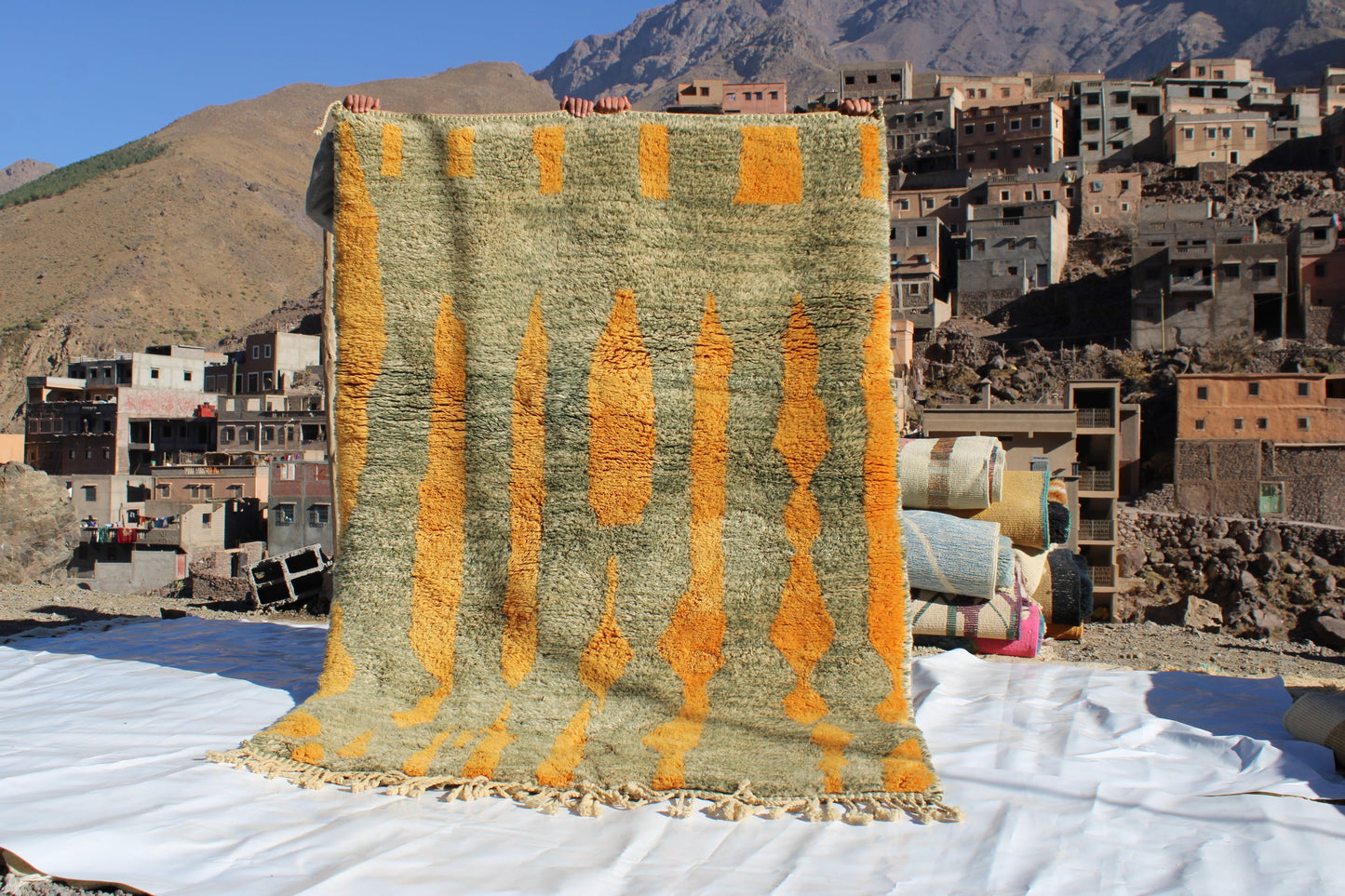 Beni Ourain rugs originate from the Atlas Mountains of Morocco and are characterized by their distinctive, neutral-toned, and geometric designs. These handwoven rugs often feature a plush pile and are made by the Berber tribes,  size is 230x155 cm