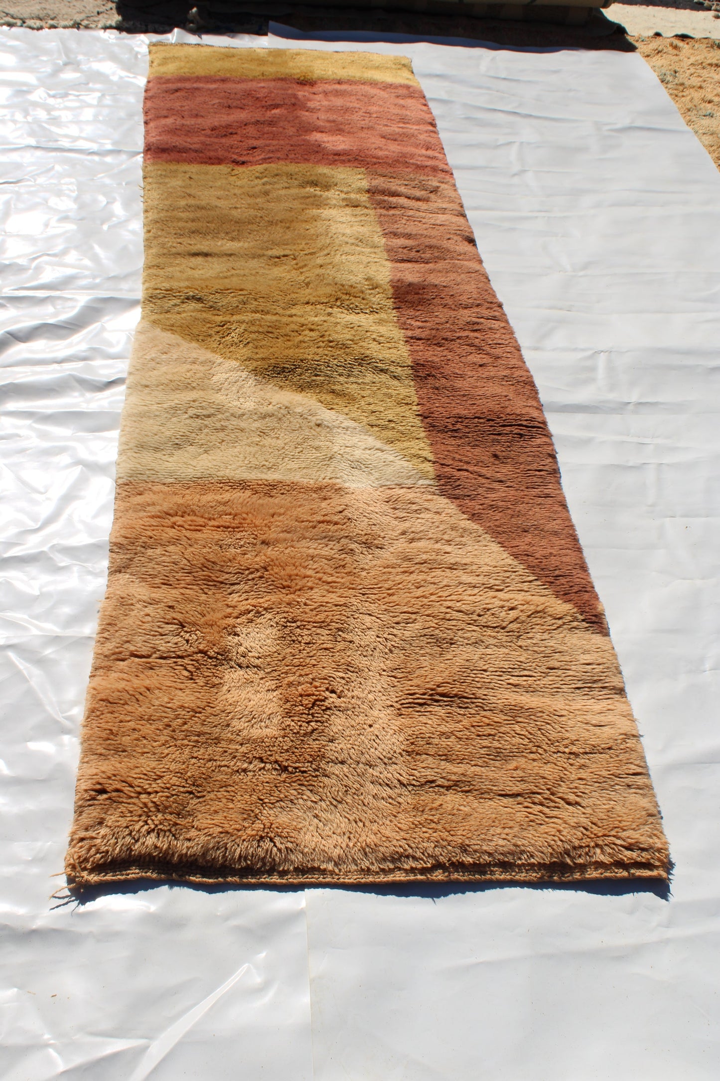 Beni Ourain rugs originate from the Atlas Mountains of Morocco and are characterized by their distinctive, neutral-toned, and geometric designs. These handwoven rugs often feature a plush pile and are made by the Berber tribes,  size is 280x177 cm